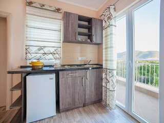 Апартаменты Pansion Nobel Петровац Трехместный номер-студио с балконом и видом на море-6